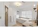 Bathroom features a bathtub and separate walk-in shower at 124 The Prado, Atlanta, GA 30309