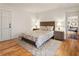 Bedroom boasts wood floors, and a cozy rug at 124 The Prado, Atlanta, GA 30309