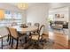 Dining room with elegant lighting fixture and hardwood floors at 124 The Prado, Atlanta, GA 30309