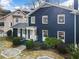 Charming home with a well-manicured lawn and beautiful landscaping at 124 The Prado, Atlanta, GA 30309