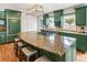 Spacious kitchen featuring a center island, granite countertops, and stainless appliances at 124 The Prado, Atlanta, GA 30309