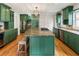 A large kitchen with granite countertops, custom cabinets, and stainless appliances at 124 The Prado, Atlanta, GA 30309