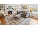 Cozy living room with hardwood floors, fireplace, and built-in shelving at 124 The Prado, Atlanta, GA 30309