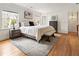 The main bedroom has hardwood floors and ample natural light at 124 The Prado, Atlanta, GA 30309