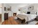 The main bedroom features a fireplace and hardwood floors at 124 The Prado, Atlanta, GA 30309