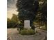 Ansley Park community sign surrounded by lush greenery at 124 The Prado, Atlanta, GA 30309