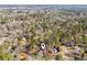 Overhead image of a home surrounded by dense trees in a quiet, residential community at 2110 Laurel Mill Way, Roswell, GA 30076