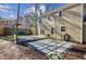 Backyard features a wood deck, patio area, well-manicured lawn, and mature trees at 2110 Laurel Mill Way, Roswell, GA 30076