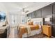 Spacious bedroom with a king bed, board and batten accent wall, ceiling fan, and plenty of natural light at 2110 Laurel Mill Way, Roswell, GA 30076