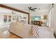 Bright living room with a beamed ceiling, fireplace and a comfortable sofa at 2110 Laurel Mill Way, Roswell, GA 30076