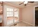 This sunroom features tile floors and french doors leading to the outside at 4205 S Hurt Sw Rd, Smyrna, GA 30082