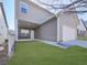 Exterior of home features an attached two car garage and covered back patio at 426 Parkstone Dr, Woodstock, GA 30188