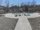 Community pool with lounge chairs and umbrellas set on a spacious deck for relaxing at 426 Parkstone Dr, Woodstock, GA 30188