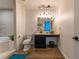 Contemporary bathroom featuring a vessel sink, modern lighting, and a jacuzzi tub at 174 Chester Se Ave # 127, Atlanta, GA 30316