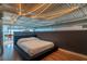 Comfortable bedroom showcasing a sleek platform bed and hardwood floors at 174 Chester Se Ave # 127, Atlanta, GA 30316