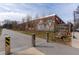 An exterior view of a brick building with art and a sidewalk and bike path at 174 Chester Se Ave # 127, Atlanta, GA 30316