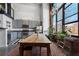 Well lit kitchen with stainless steel appliances, with exposed brick and large windows at 174 Chester Se Ave # 127, Atlanta, GA 30316