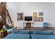 Well lit living room with exposed brick wall, ladder access and comfortable seating at 174 Chester Se Ave # 127, Atlanta, GA 30316