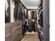 Spacious walk-in closet with custom shelving and drawers for optimal storage at 174 Chester Se Ave # 127, Atlanta, GA 30316