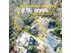 An aerial view showcases the .96 acre lot of this charming property with mature trees at 2953 Hardman Ne Ct, Atlanta, GA 30305