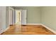 Spacious bedroom with hardwood floors and view of multiple doorways at 2953 Hardman Ne Ct, Atlanta, GA 30305