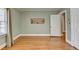 Bedroom features hardwood floors, light green walls, white trim and natural light at 2953 Hardman Ne Ct, Atlanta, GA 30305