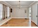 Dining room featuring hardwood floors, chandelier, and neutral color palette at 2953 Hardman Ne Ct, Atlanta, GA 30305