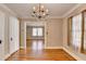 Bright dining area boasts hardwood floors and decorative lighting at 2953 Hardman Ne Ct, Atlanta, GA 30305