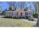 Charming single-story home with red shutters, dormer windows, and a well-manicured front yard at 2953 Hardman Ne Ct, Atlanta, GA 30305