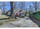 Charming single-story home with red shutters, dormer windows, and a well-manicured front yard at 2953 Hardman Ne Ct, Atlanta, GA 30305