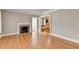 Open living area with fireplace and view into the dining room at 2953 Hardman Ne Ct, Atlanta, GA 30305