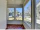 This Screened Porch features multiple windows and a red tiled floor at 2953 Hardman Ne Ct, Atlanta, GA 30305