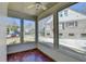 This Screened Porch features multiple windows and a red tiled floor at 2953 Hardman Ne Ct, Atlanta, GA 30305