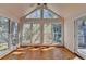 Sun room featuring hardwood floors, cathedral ceilings, and large windows for ample natural light at 2953 Hardman Ne Ct, Atlanta, GA 30305