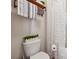 Bright half-bathroom featuring clean white fixtures, modern tile work, and a minimalist design at 4727 Tiger Blvd, Duluth, GA 30096