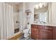 Stylish bathroom with shower and bathtub featuring a modern vanity and ample counter space at 4727 Tiger Blvd, Duluth, GA 30096