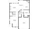 First floor layout with living room, dining area, kitchen, garage, and bedroom at 4727 Tiger Blvd, Duluth, GA 30096