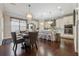 Modern kitchen with stainless steel appliances, a center island, and an adjacent breakfast nook at 4727 Tiger Blvd, Duluth, GA 30096