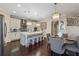 Bright kitchen with stainless steel appliances, a center island with seating, and an adjacent dining area at 4727 Tiger Blvd, Duluth, GA 30096