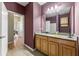 Comfortable bathroom featuring granite countertops and a neutral color scheme with a view to the hallway at 4805 W Village Se Way # 2108, Smyrna, GA 30080