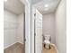 Bathroom with walk-in closet and a toilet room for increased functionality at 1540 Denver Way, Locust Grove, GA 30248