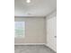 Neutral bedroom with a window letting in plenty of natural light at 1540 Denver Way, Locust Grove, GA 30248