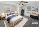 Cozy bedroom featuring plush carpeting, a ceiling fan, and neutral paint, virtually staged at 4152 Coconut Nw Grv, Acworth, GA 30101