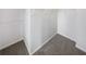 Functional walk-in closet with built-in shelving, providing ample storage for clothing and accessories at 4152 Coconut Nw Grv, Acworth, GA 30101
