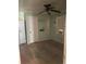 Cozy bedroom with vintage ceiling fan, wood paneling, and a window unit air conditioner at 982 Scott Cir, Decatur, GA 30033