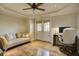 Home office space with hardwood floors, neutral walls, and French doors at 11020 Bradford Ln, Suwanee, GA 30024