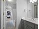 Neutral bathroom with white countertop vanity, chrome fixtures and a shower-tub combo at 1207 Woodlawn Ne Dr, Marietta, GA 30068