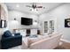 Living room with white trim, built in shelving, a large flat screen TV, and comfortable seating at 1207 Woodlawn Ne Dr, Marietta, GA 30068