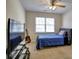 Bedroom with neutral walls, a ceiling fan and a window at 1326 Nantahala Ne Trl, Marietta, GA 30062