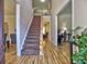 Inviting foyer with hardwood floors, staircase, and natural light at 1326 Nantahala Ne Trl, Marietta, GA 30062